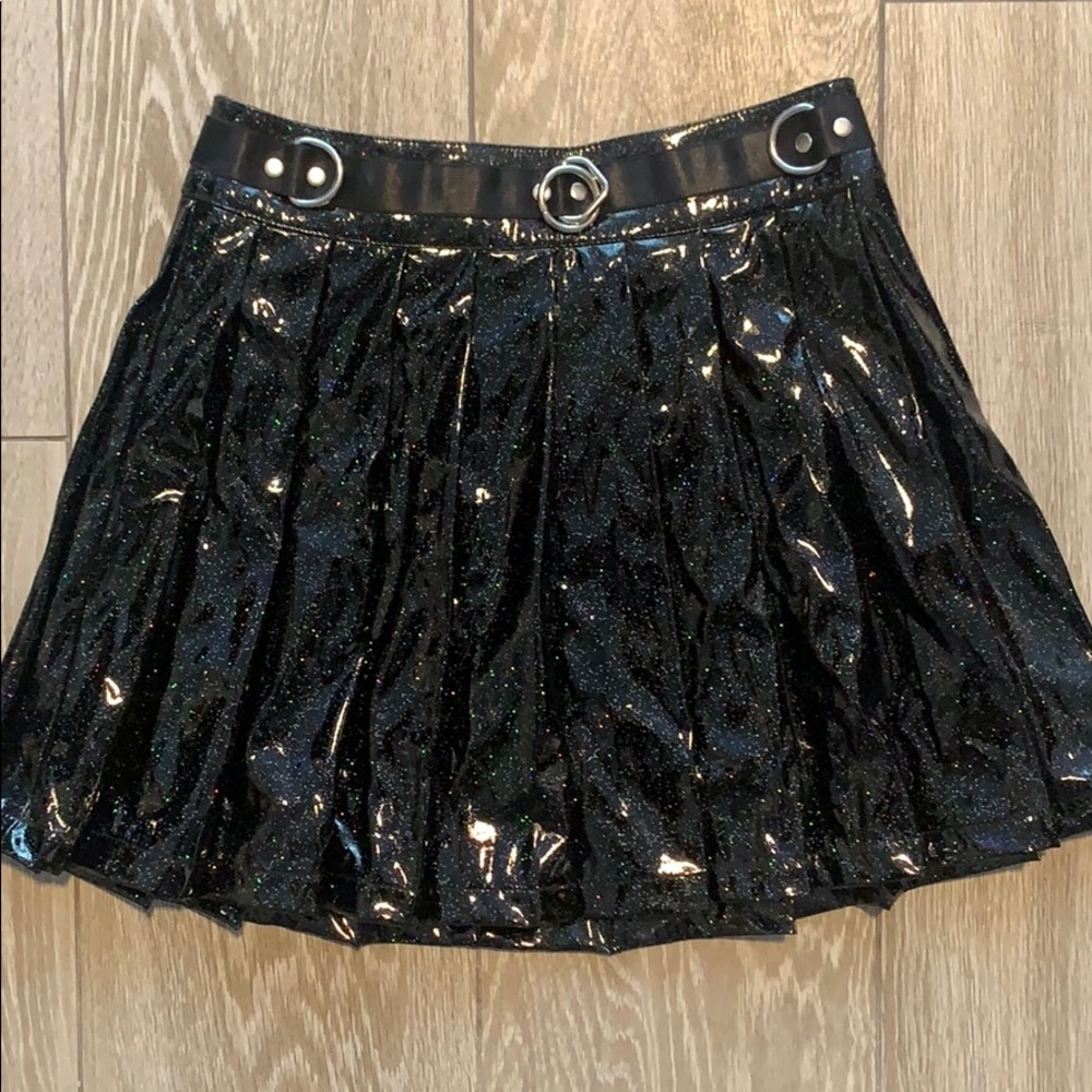 Black glitter polyurethane skirt with metal rings
